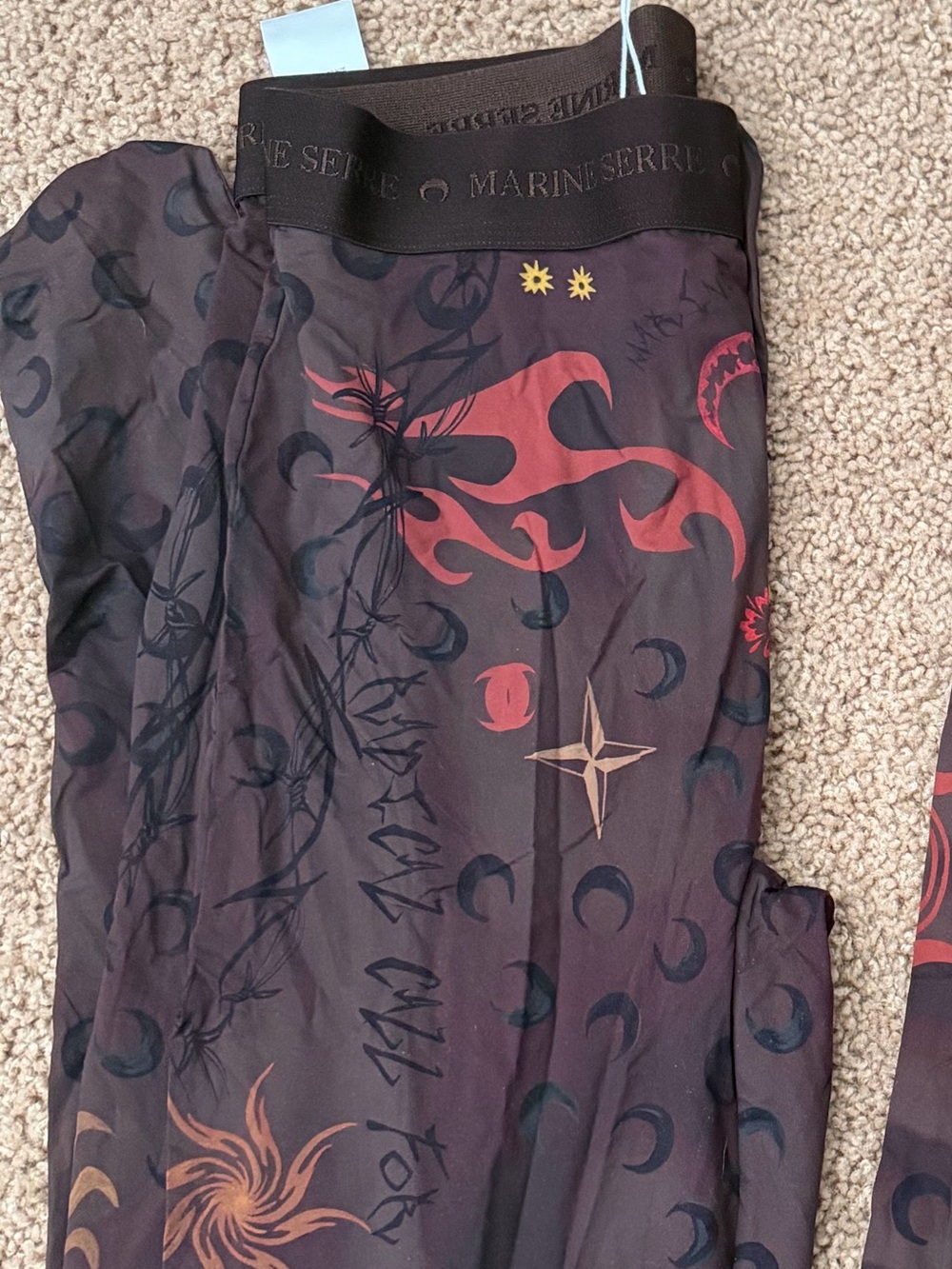 Marine Serre brown and red printed leggings